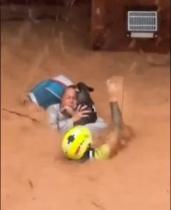 Woman and Her Dog Rescued from Deadly Floods in Spain